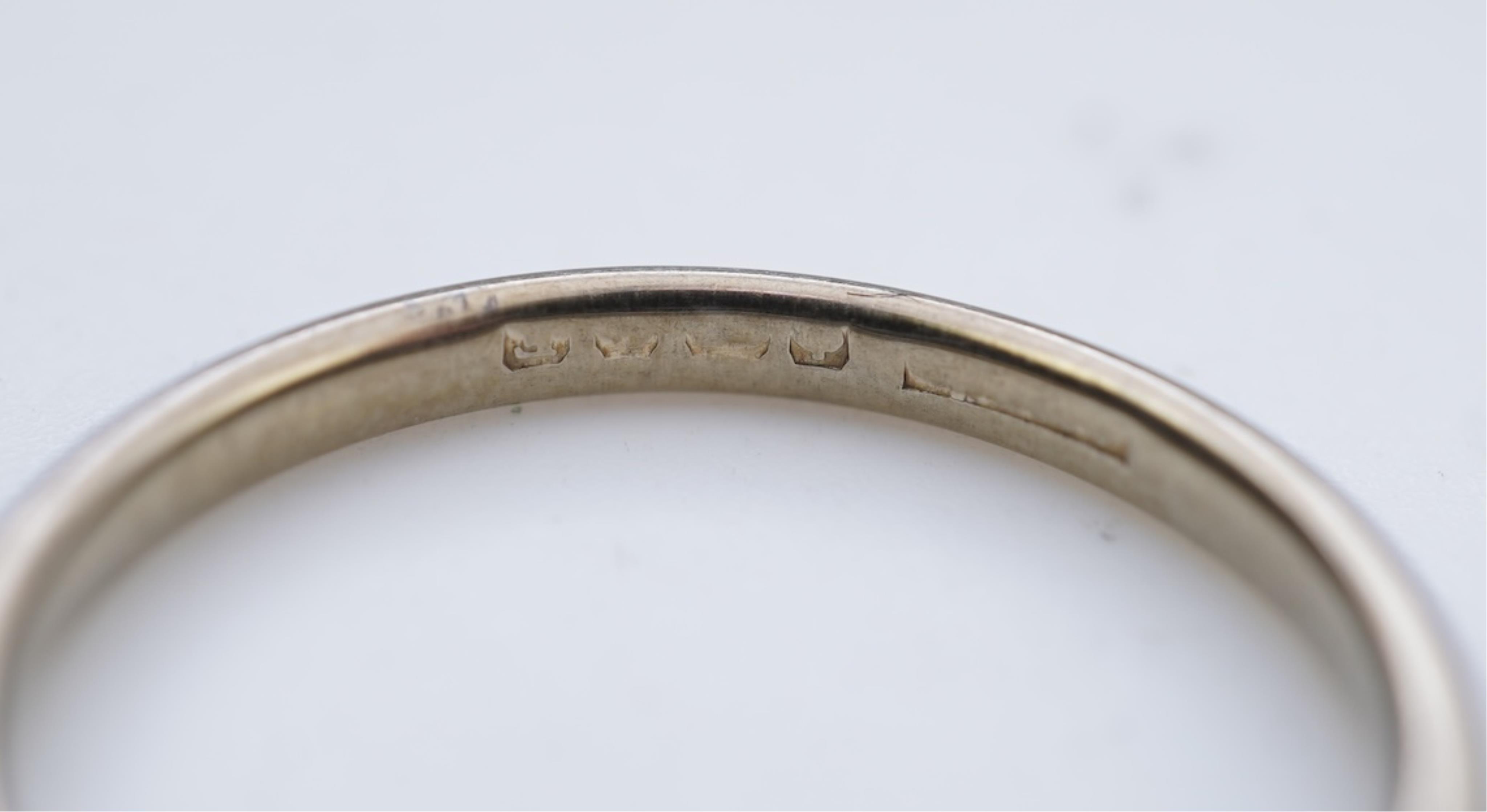 A collection of six gold wedding bands